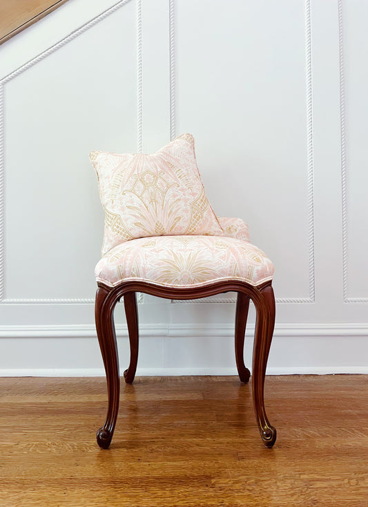 custom pillow in Schumacher cap ferrat fabric in blush on a matching pieces of vintage furniture