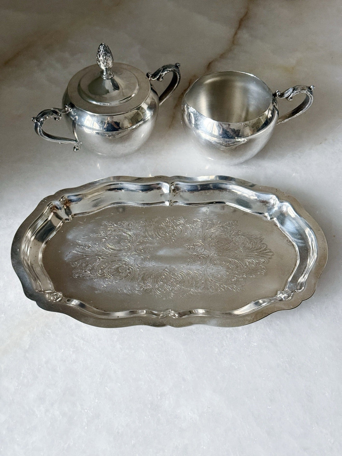 Close-up of the etched detailing on the vintage silverplate tray