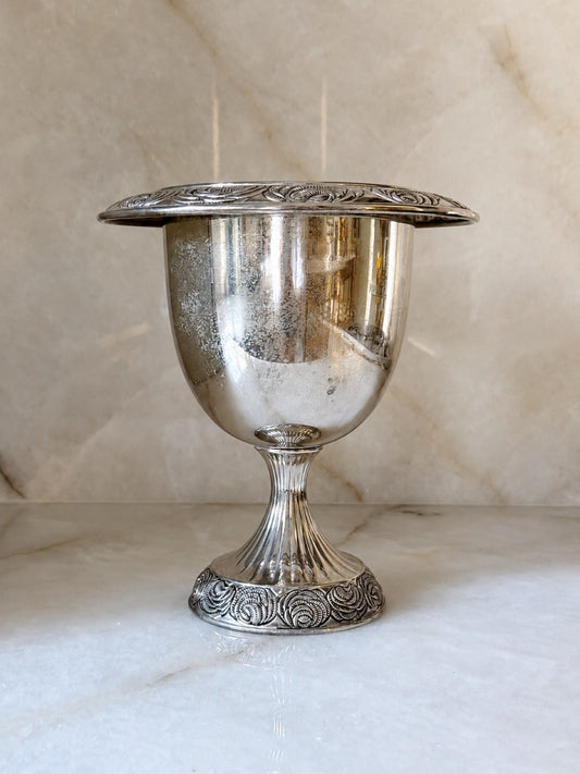 Vintage silver pedestal urn with rosette detailing, front view